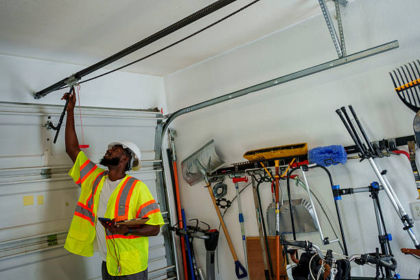 Professional Garage Door Panel Replacement technician working in West Haven, UT